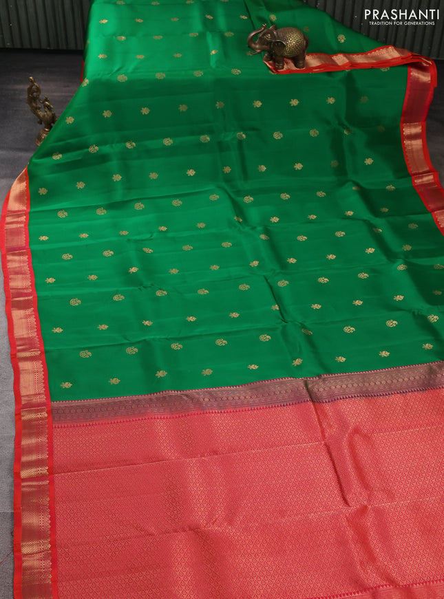 Kanchipuram silk saree light green and orange with allover zari woven buttas and zari woven border
