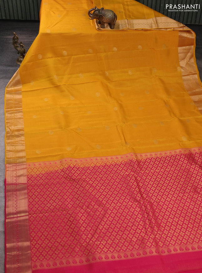Kanchipuram silk saree mustard yellow and pink with allover vairosi pattern & zari buttas and zari woven border