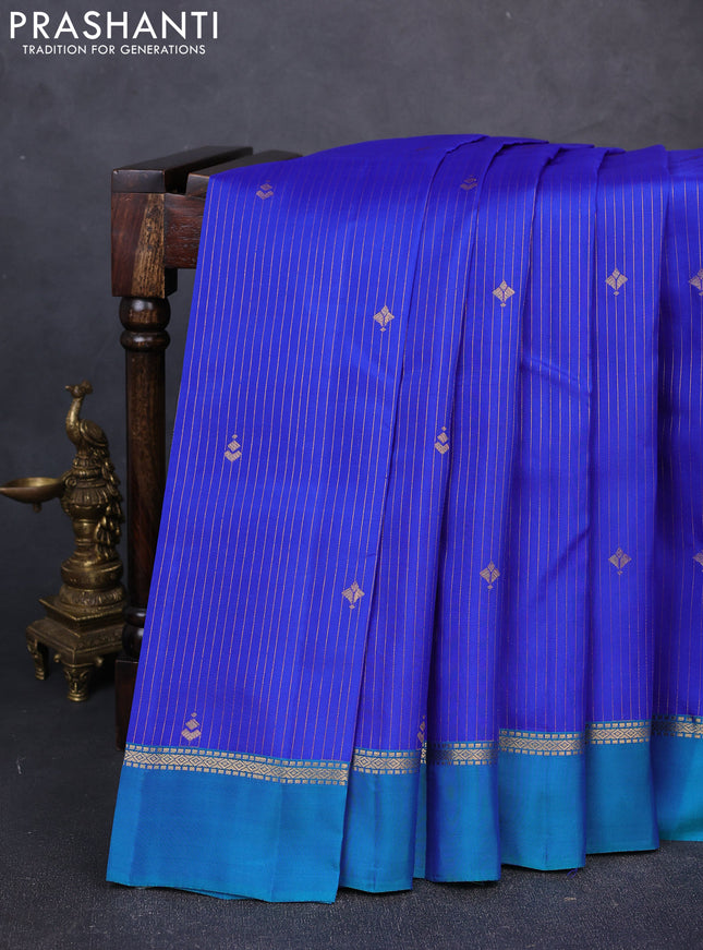 Kanchipuram silk saree royal blue and peacock green with allover zari woven stripes & buttas and zari woven simple border