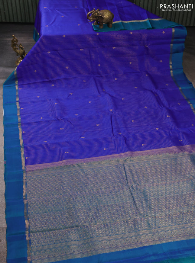 Kanchipuram silk saree royal blue and peacock green with allover zari woven stripes & buttas and zari woven simple border