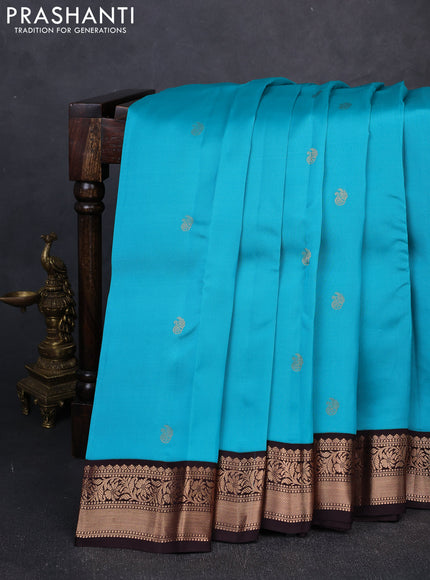 Kanchipuram silk saree teal blue and coffee brown with zari woven buttas and zari woven border