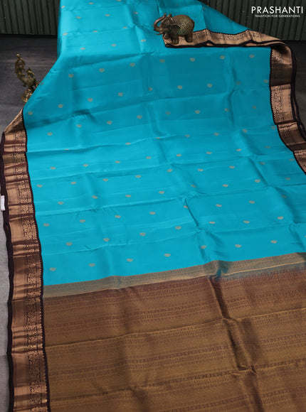 Kanchipuram silk saree teal blue and coffee brown with zari woven buttas and zari woven border