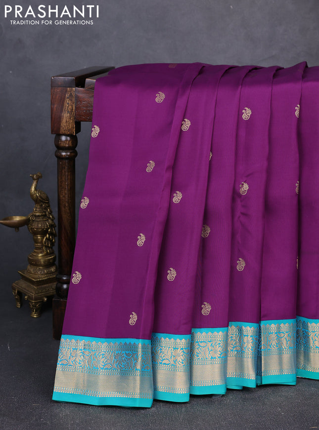 Kanchipuram silk saree purple and teal green with zari woven buttas and zari woven border