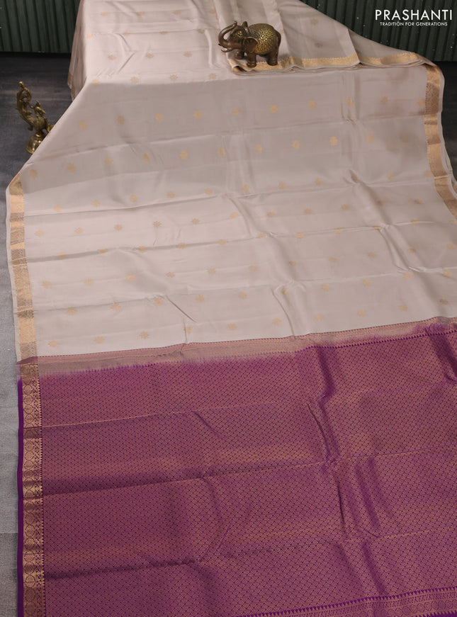 Kanchipuram silk saree beige and purple with zari woven buttas and zari woven border