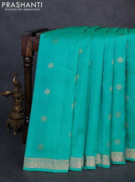 Kanchipuram silk saree teal green and purple with allover zari woven buttas and zari woven border