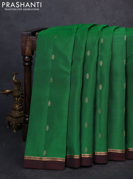 Kanchipuram silk saree green and coffee brown with allover zari woven buttas and zari woven simple border