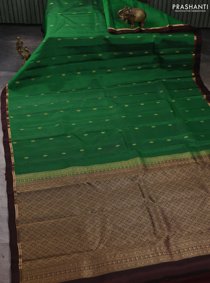 Kanchipuram silk saree green and coffee brown with allover zari woven buttas and zari woven simple border
