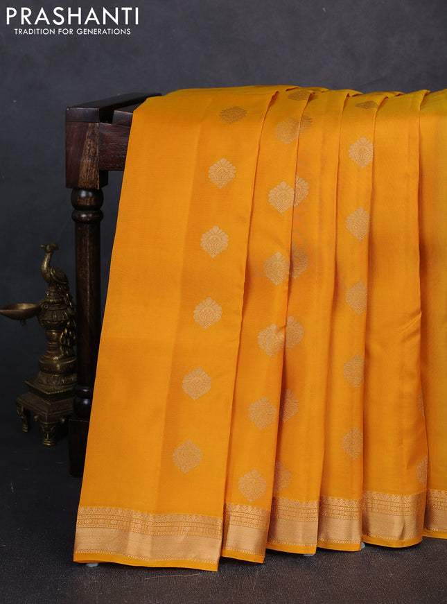 Kanchipuram silk saree mustard yellow and purple with allover zari woven buttas and zari woven border