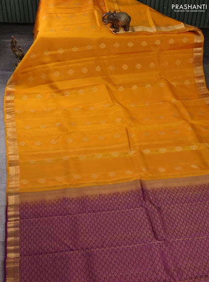 Kanchipuram silk saree mustard yellow and purple with allover zari woven buttas and zari woven border