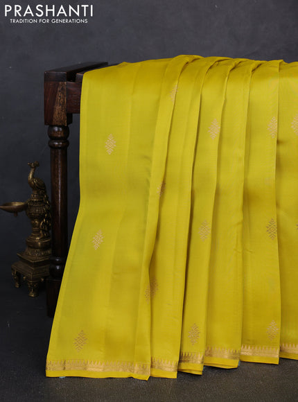 Kanchipuram silk saree lime yellow and beige with allover zari woven buttas and small zari woven border