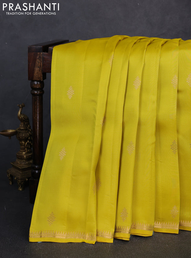 Kanchipuram silk saree lime yellow and beige with allover zari woven buttas and small zari woven border