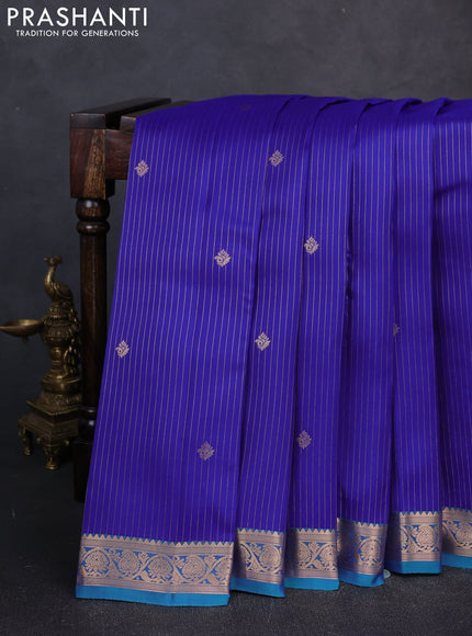 Kanchipuram silk saree royal blue and peacock blue with allover zari woven stripes & buttas and zari woven simple border
