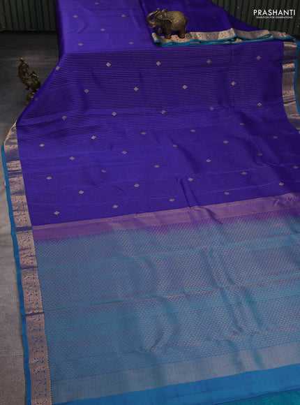 Kanchipuram silk saree royal blue and peacock blue with allover zari woven stripes & buttas and zari woven simple border