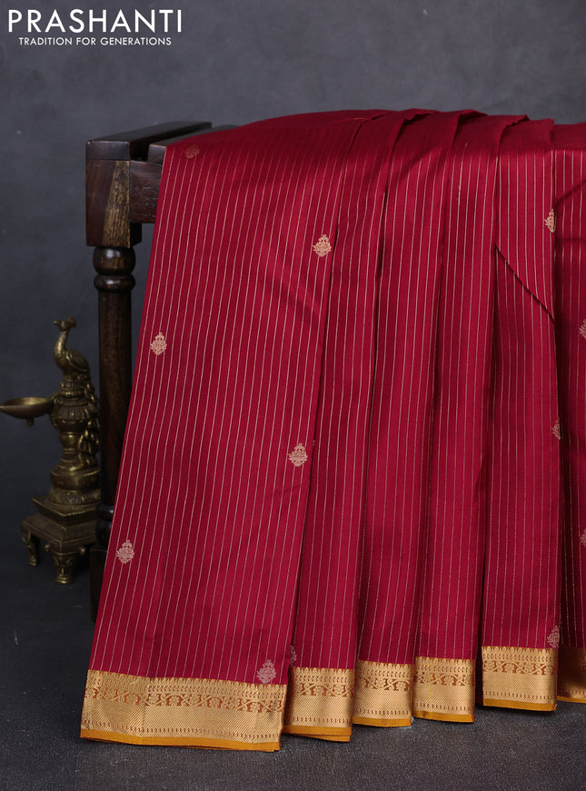 Kanchipuram silk saree maroon and mustard yellow with allover zari woven stripes & buttas and zari woven border