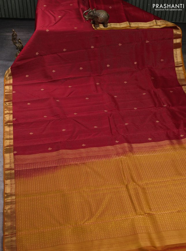 Kanchipuram silk saree maroon and mustard yellow with allover zari woven stripes & buttas and zari woven border