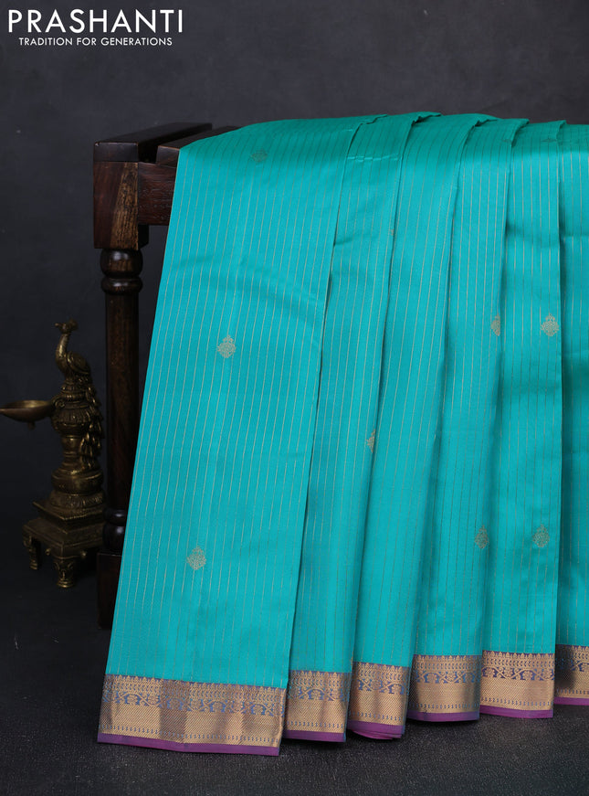 Kanchipuram silk saree teal green and dual shade of purple with allover zari woven stripes & buttas and zari woven border