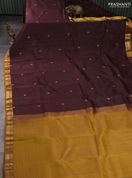 Kanchipuram silk saree coffee brown and mustard green with allover zari woven stripes & buttas and zari woven simple border