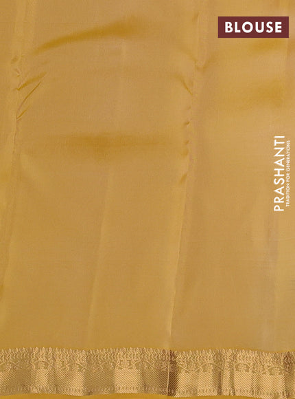 Kanchipuram silk saree mild pista green and mustard yellow with allover zari woven stripes & buttas and zari woven simple border