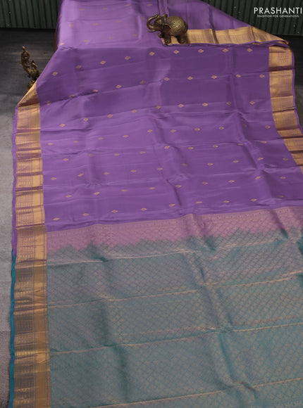 Kanchipuram silk saree lavender and teal green with allover zari woven buttas and rich zari woven border