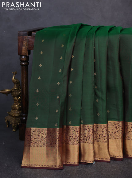 Kanchipuram silk saree bottle green and coffee brown with allover zari woven buttas and long rich zari woven border