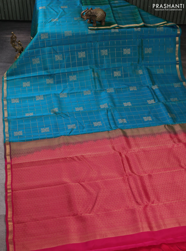 Kanchipuram silk saree teal green and tomato pink with allover zari checks & buttas and rich zari woven border