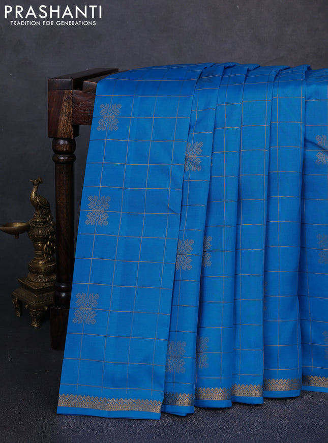 Kanchipuram silk saree cs blue and tomato pink with allover zari checks & buttas and rich zari woven border