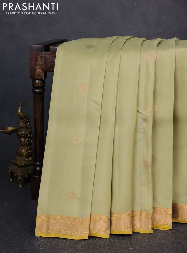 Kanchipuram silk saree pastel green and lime yellow with zari woven buttas and zari woven border