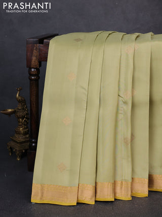 Kanchipuram silk saree pastel green and lime yellow with zari woven buttas and zari woven border