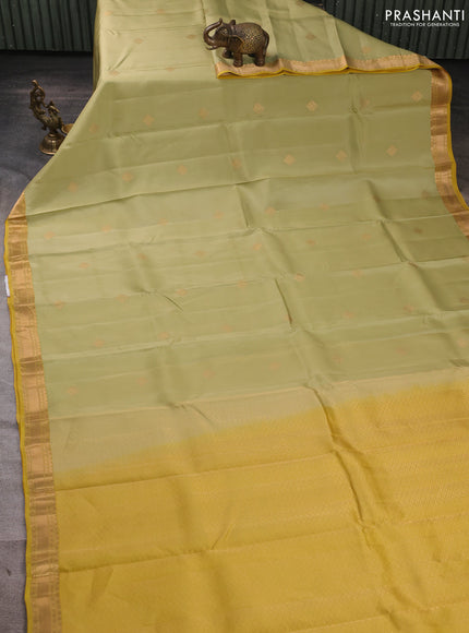 Kanchipuram silk saree pastel green and lime yellow with zari woven buttas and zari woven border