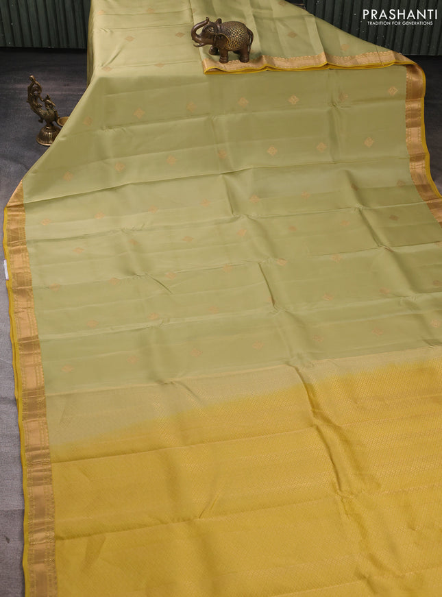 Kanchipuram silk saree pastel green and lime yellow with zari woven buttas and zari woven border