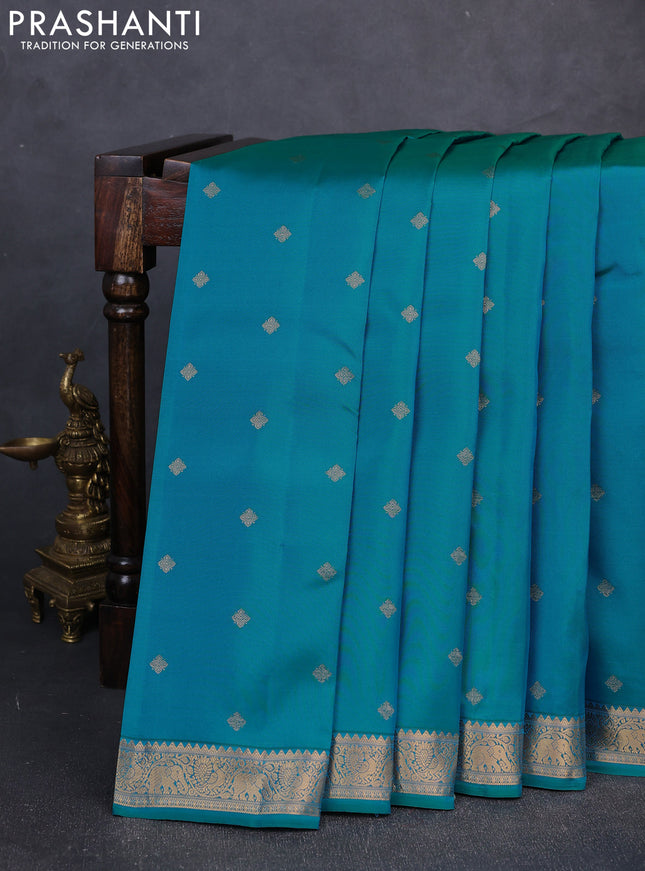 Kanchipuram silk saree teal blue and tomato pink with allover zari woven buttas and zari woven border