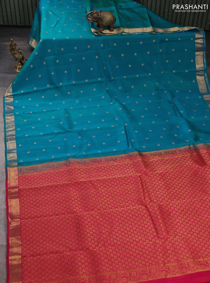 Kanchipuram silk saree teal blue and tomato pink with allover zari woven buttas and zari woven border