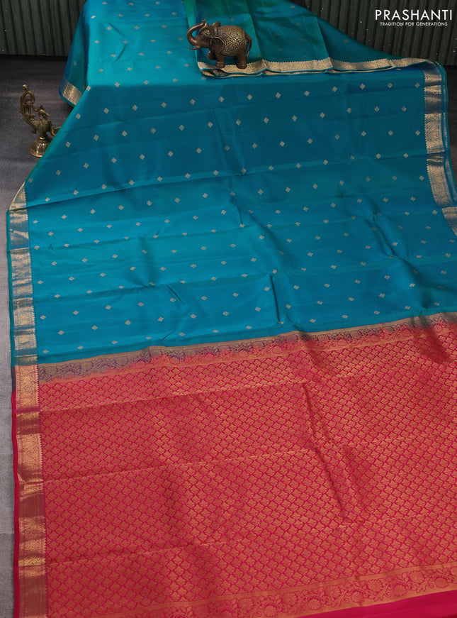 Kanchipuram silk saree teal blue and tomato pink with allover zari woven buttas and zari woven border