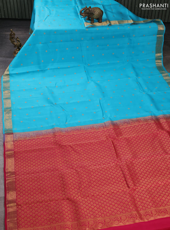 Kanchipuram silk saree teal blue and tomato pink with allover zari woven buttas and zari woven border