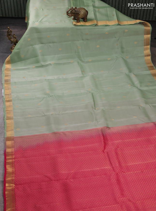 Kanchipuram silk saree teal shade and pink with allover zari woven buttas and zari woven border