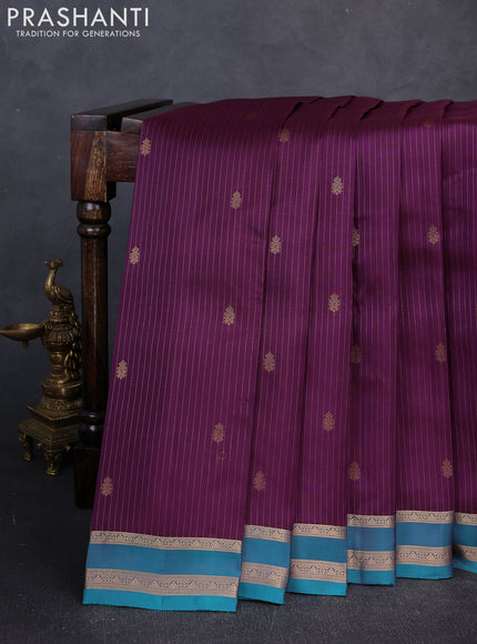 Kanchipuram silk saree deep purple and peacock green with allover zari woven stripes & buttas and zari woven border
