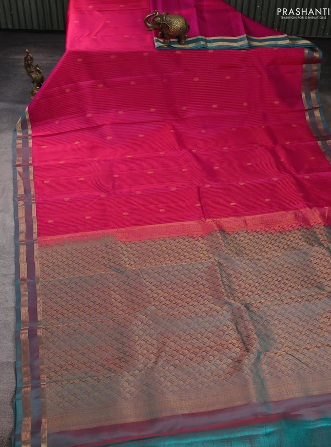Kanchipuram silk saree pink and dual shade of teal green with allover zari woven stripes & buttas and zari woven border