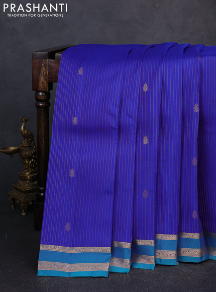 Kanchipuram silk saree royal blue and peacock blue with allover zari woven stripes & buttas and zari woven border