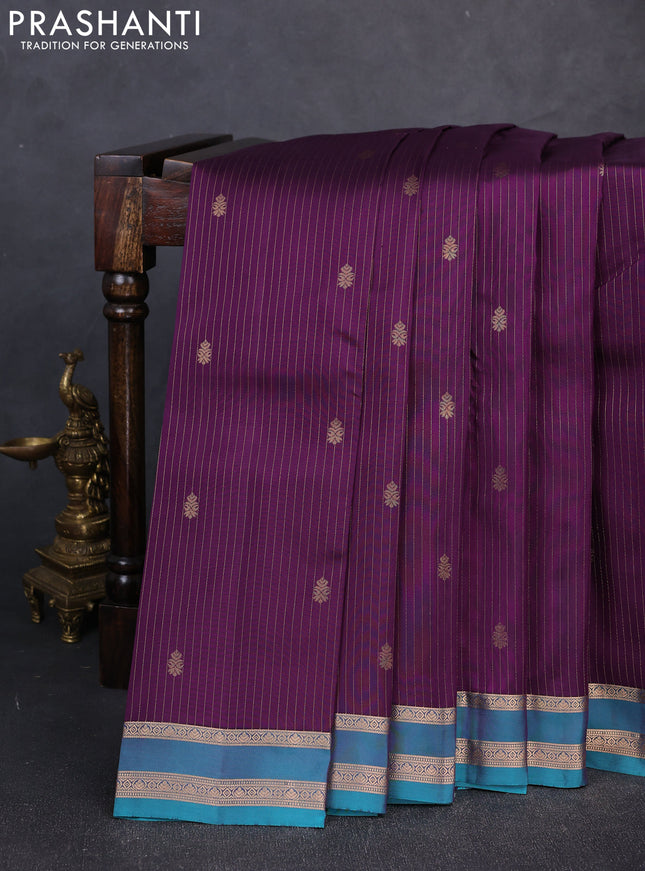 Kanchipuram silk saree deep purple and peacock green with allover zari woven stripes & buttas and rettapet zari woven border