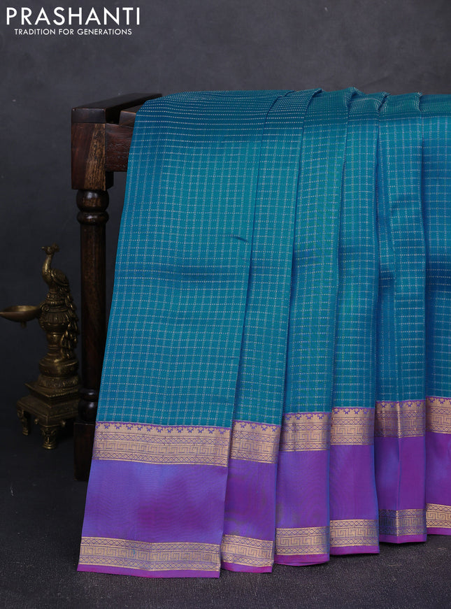 Kanchipuram silk saree cs blue and dual shade of purple with allover zari checked pattern and rettapet zari woven border