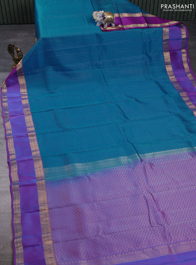 Kanchipuram silk saree cs blue and dual shade of purple with allover zari checked pattern and rettapet zari woven border