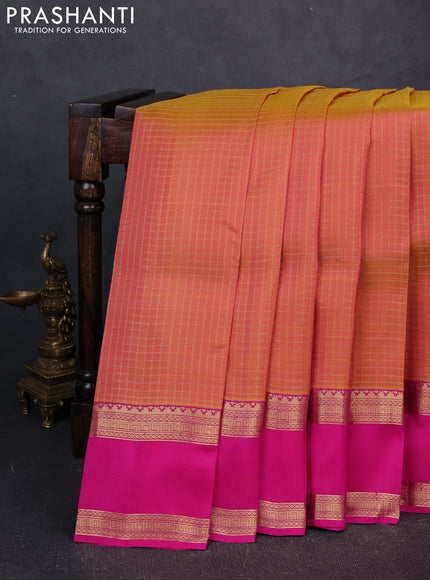 Kanchipuram silk saree dual shade of pinkish orange and pink with allover zari checked pattern and rettapet zari woven border