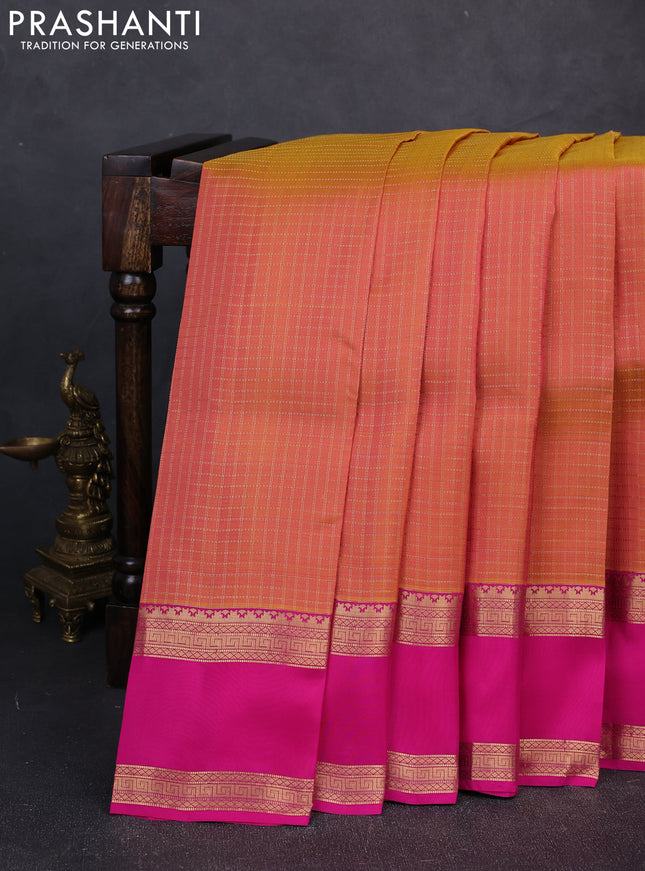 Kanchipuram silk saree dual shade of pinkish orange and pink with allover zari checked pattern and rettapet zari woven border
