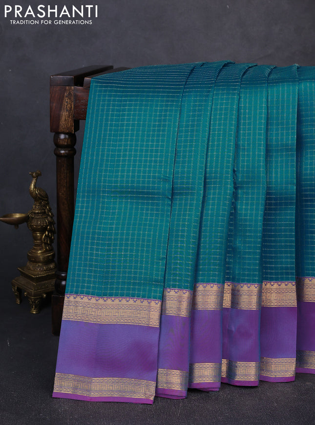 Kanchipuram silk saree teal blue and dual shade of purple with allover zari checked pattern and rettapet zari woven border