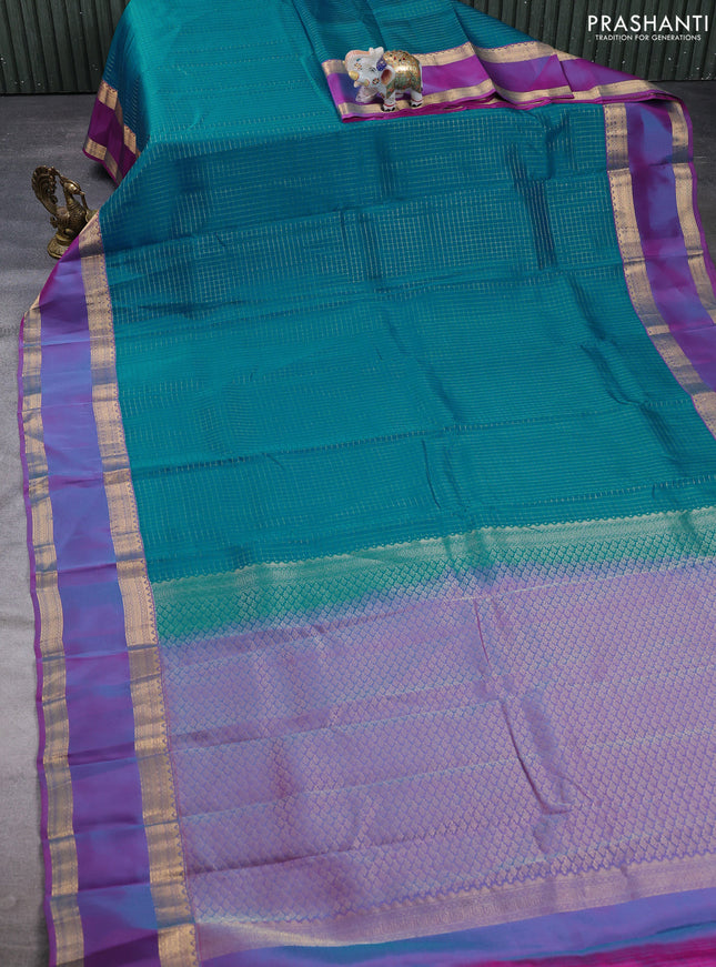 Kanchipuram silk saree teal blue and dual shade of purple with allover zari checked pattern and rettapet zari woven border