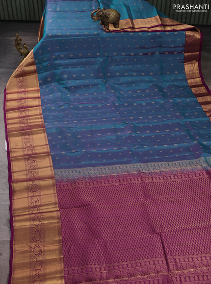 Kanchipuram silk saree peacock blue and purple with allover zari woven buttas and long rich zari woven border