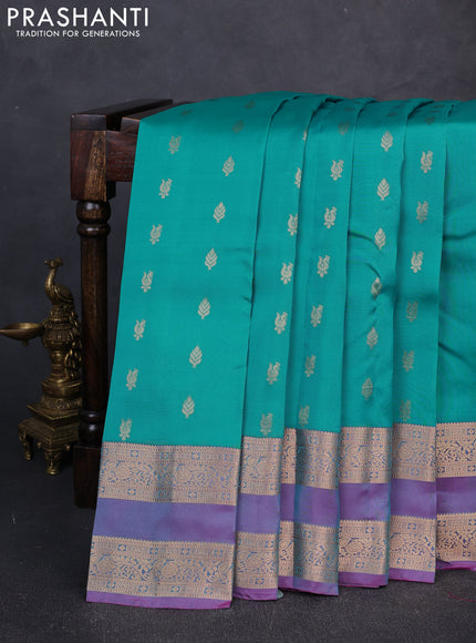 Kanchipuram silk saree teal blue and dual shade of purple with allover zari woven buttas and rettapet zari woven border