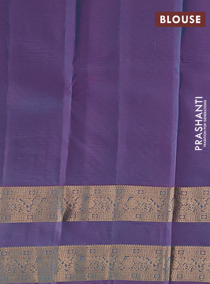 Kanchipuram silk saree teal blue and dual shade of purple with allover zari woven buttas and rettapet zari woven border