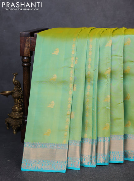 Kanchipuram silk saree dual shade of greenish yellow and teal green with allover zari woven stripes & buttas and zari woven simple border