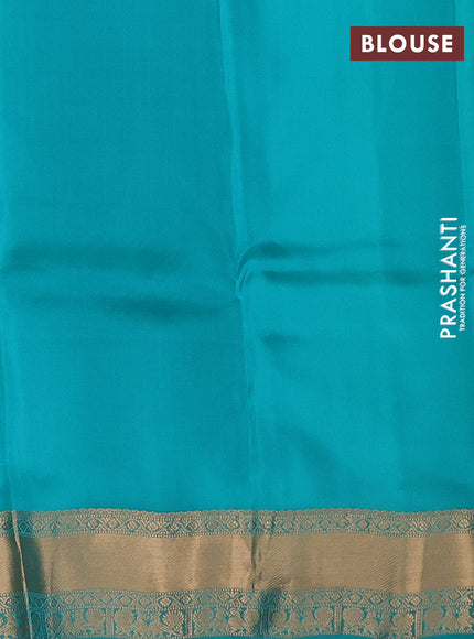 Kanchipuram silk saree dual shade of greenish yellow and teal green with allover zari woven stripes & buttas and zari woven simple border